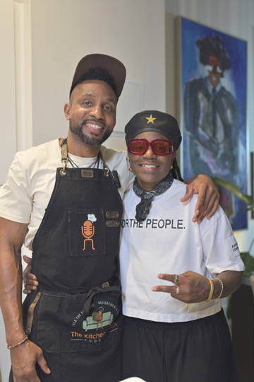 Host posing with a guest