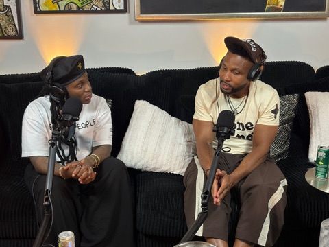 Two-person podcast conversation on the couch